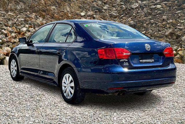 Photo of 2011 Tempest Blue Metallic Volkswagen Jetta