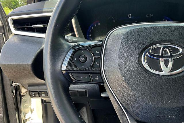Photo of 2021 Super White w/Black Sand Pearl Roof Toyota Corolla