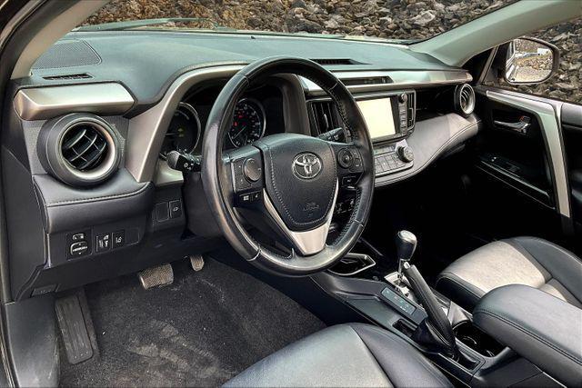 Photo of 2016 Black Sand Pearl Toyota RAV4 Hybrid