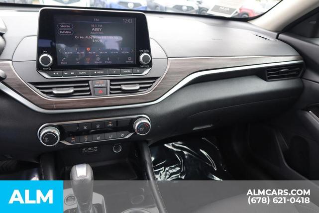 Photo of 2023 Pearl White Tri-Coat Nissan Altima