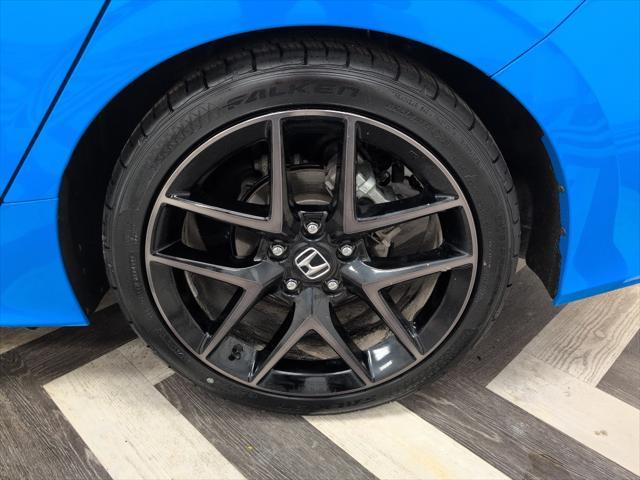 Photo of 2024 Boost Blue Pearl Honda Civic
