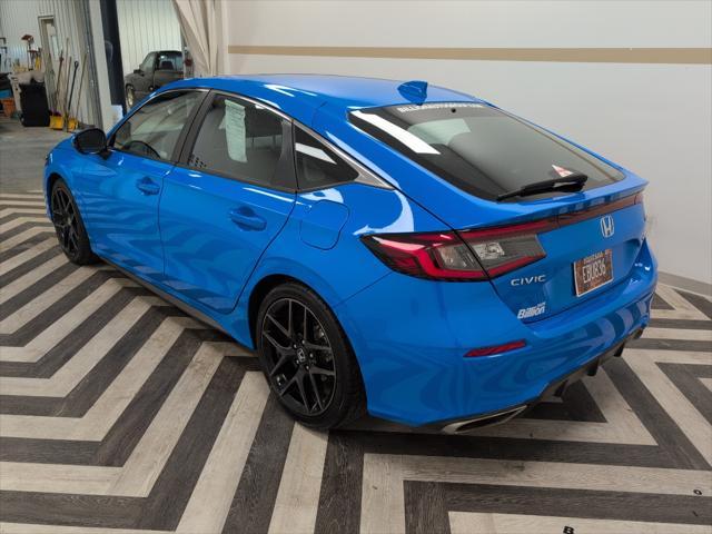 Photo of 2024 Boost Blue Pearl Honda Civic