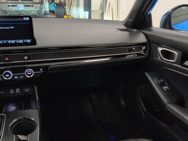 Photo of 2024 Boost Blue Pearl Honda Civic