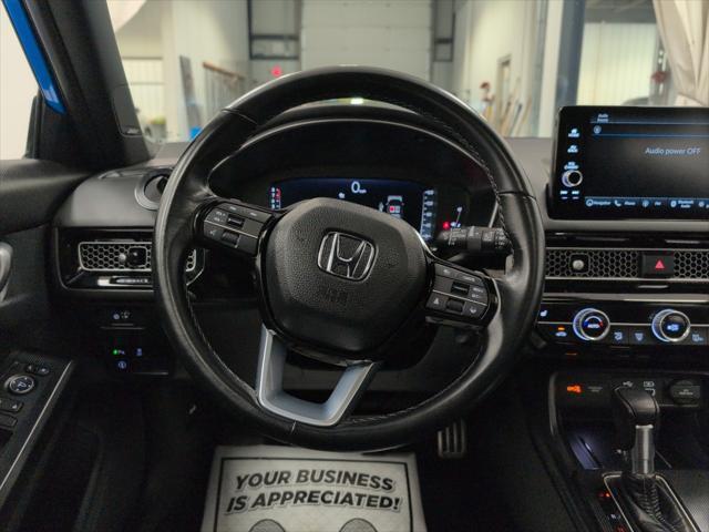 Photo of 2024 Boost Blue Pearl Honda Civic