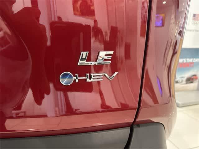 Photo of 2025 Ruby Flare Pearl Toyota RAV4 Hybrid