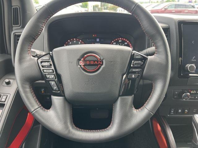 Photo of 2024 Glacier White Nissan Frontier