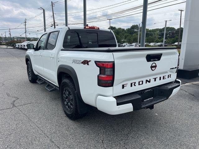 Photo of 2024 Glacier White Nissan Frontier
