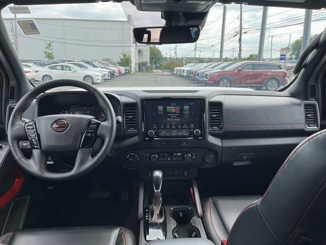 Photo of 2024 Glacier White Nissan Frontier