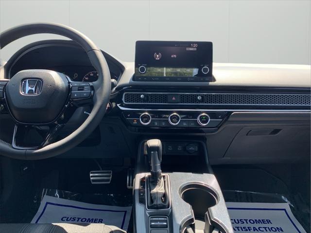 Photo of 2025 Platinum Honda Civic Hybrid