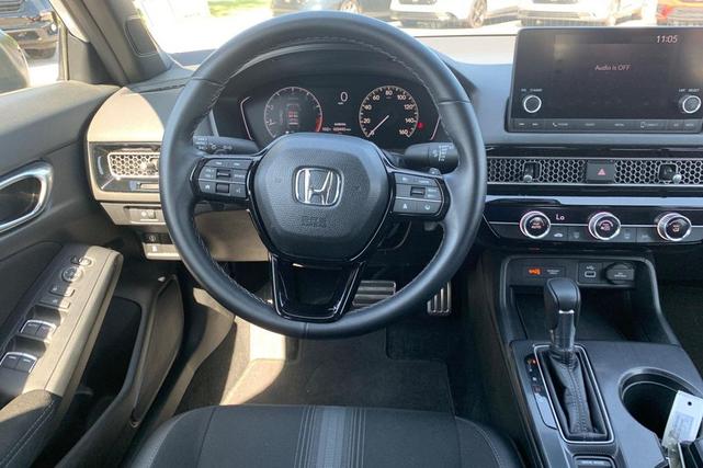 Photo of 2023 Platinum White Pearl Honda Civic