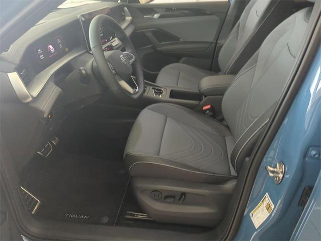 Photo of 2025 Monterey Blue w/Deep Black Roof Volkswagen Tiguan