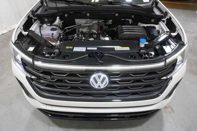 Photo of 2025 Opal White Pearl Volkswagen Atlas Cross Sport