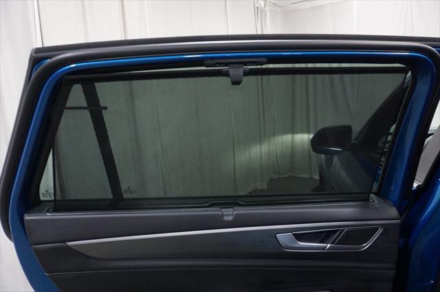 Photo of 2024 Kingfisher Blue Metallic Volkswagen Atlas Cross Sport
