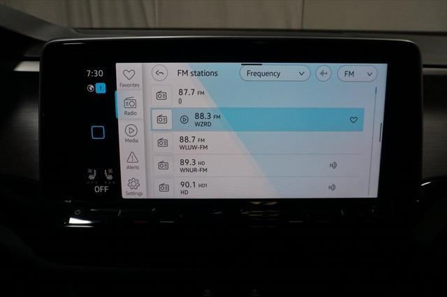 Photo of 2024 Kingfisher Blue Metallic Volkswagen Atlas Cross Sport