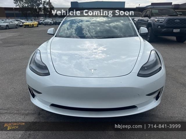 Photo of 2023 Pearl White Multi Tesla Model 3