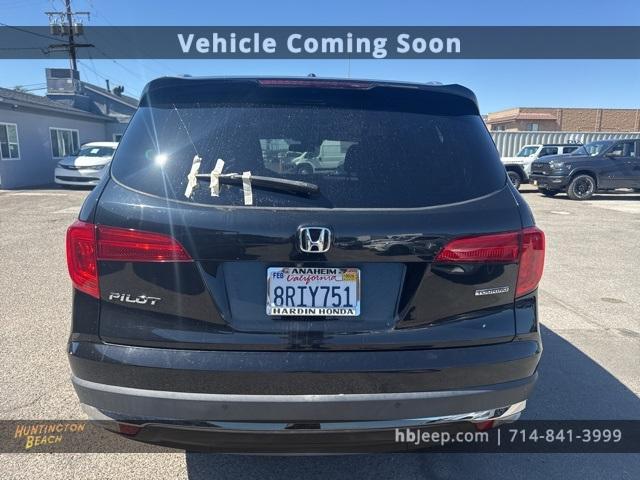 Photo of 2017 Crystal Black Pearl Honda Pilot