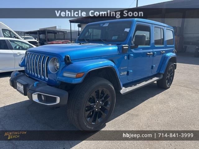Photo of 2022 Hydro Blue Pearl Jeep Wrangler Unlimited 4xe