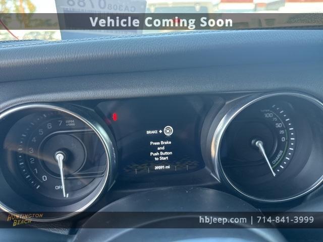Photo of 2022 Hydro Blue Pearl Jeep Wrangler Unlimited 4xe