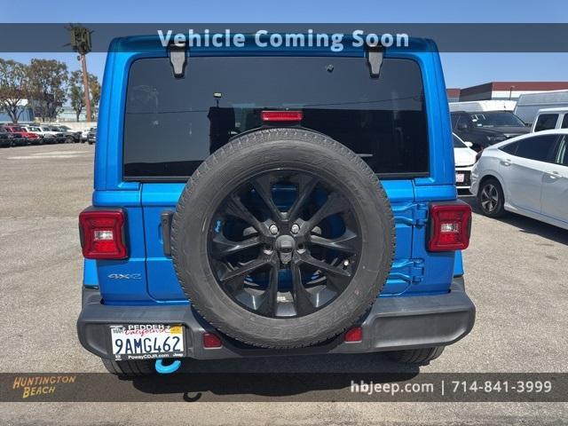 Photo of 2022 Hydro Blue Pearl Jeep Wrangler Unlimited 4xe