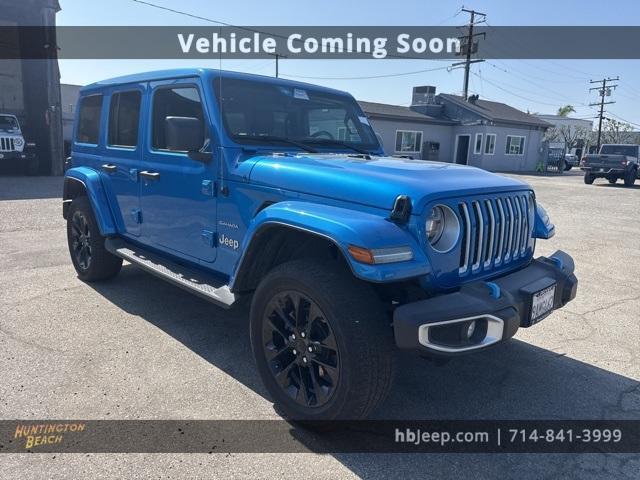Photo of 2022 Hydro Blue Pearl Jeep Wrangler Unlimited 4xe