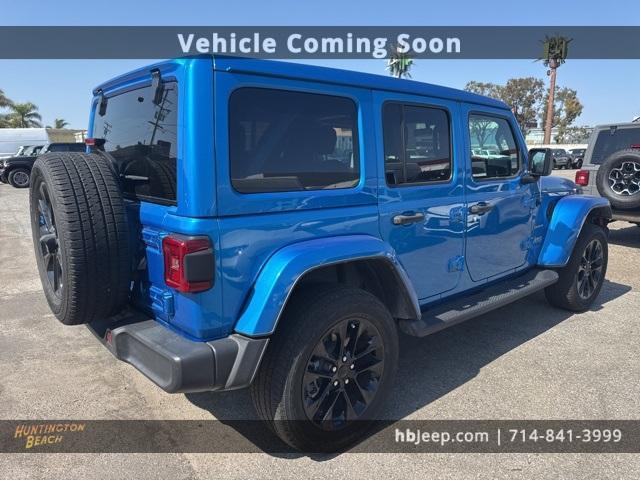 Photo of 2022 Hydro Blue Pearl Jeep Wrangler Unlimited 4xe