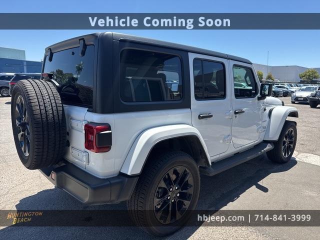 Photo of 2022 Bright White Clearcoat Jeep Wrangler Unlimited 4xe