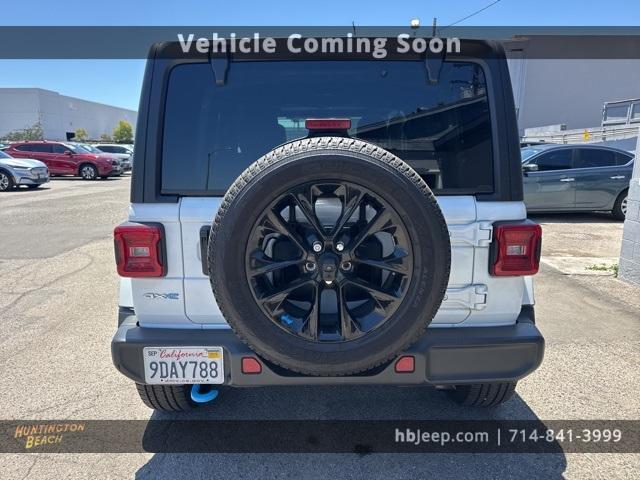 Photo of 2022 Bright White Clearcoat Jeep Wrangler Unlimited 4xe