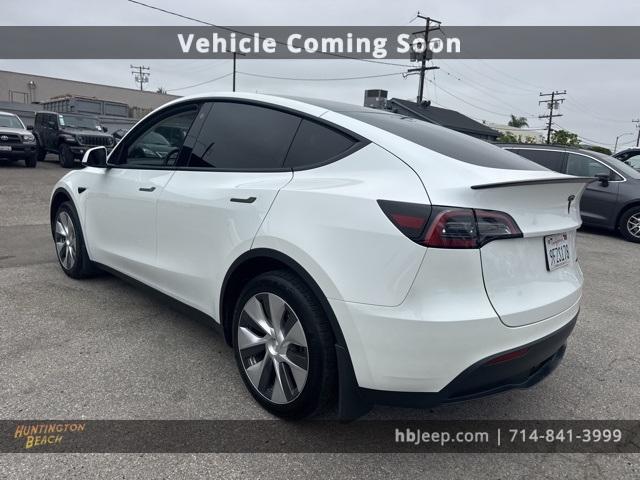 Photo of 2023 Pearl White Multi Tesla Model Y