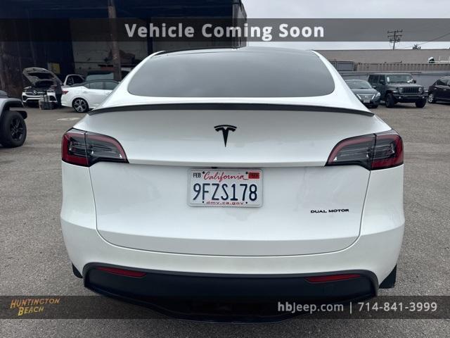 Photo of 2023 Pearl White Multi Tesla Model Y