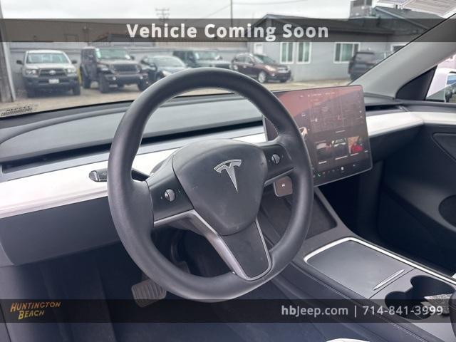 Photo of 2023 Pearl White Multi Tesla Model Y