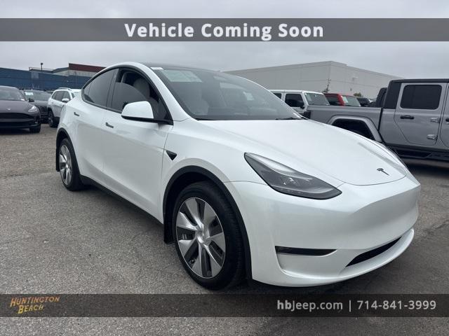 Photo of 2023 Pearl White Multi Tesla Model Y