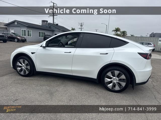 Photo of 2023 Pearl White Multi Tesla Model Y