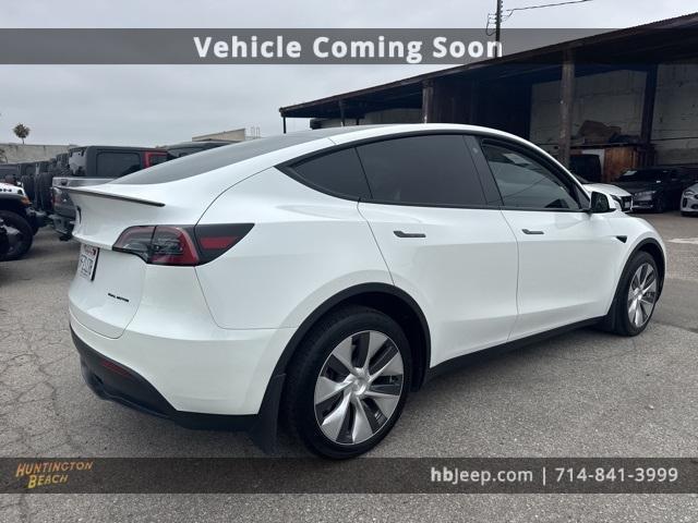 Photo of 2023 Pearl White Multi Tesla Model Y