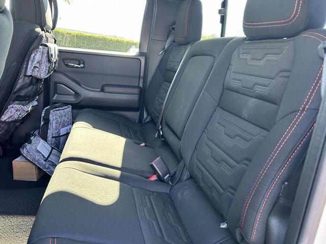 Photo of 2025 Glacier White Nissan Frontier