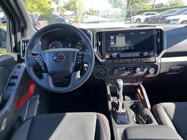 Photo of 2025 Glacier White Nissan Frontier