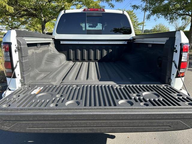 Photo of 2025 Glacier White Nissan Frontier