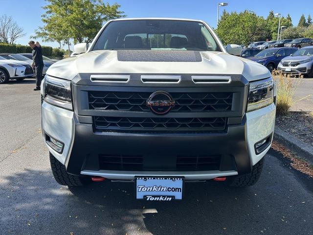 Photo of 2025 Glacier White Nissan Frontier
