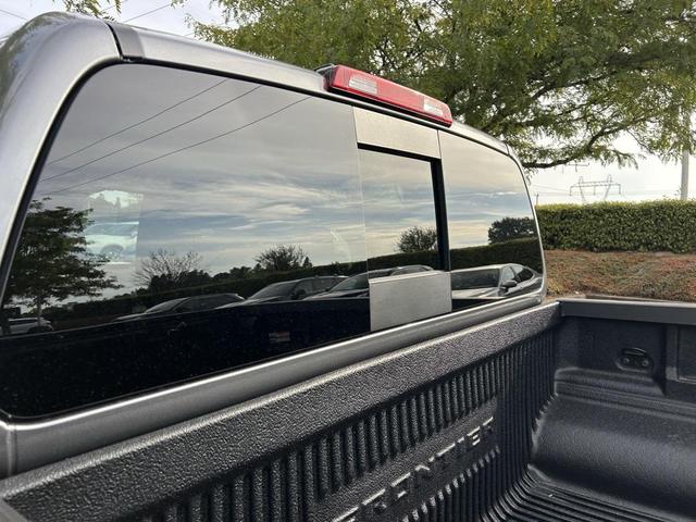 Photo of 2025 Boulder Gray Pearl Nissan Frontier