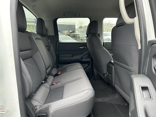 Photo of 2025 Glacier White Nissan Frontier