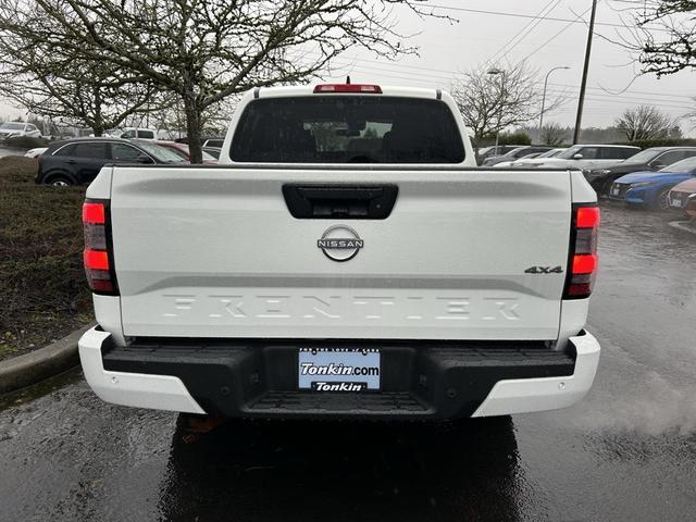 Photo of 2025 Glacier White Nissan Frontier