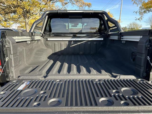 Photo of 2024 Super Black Nissan Frontier
