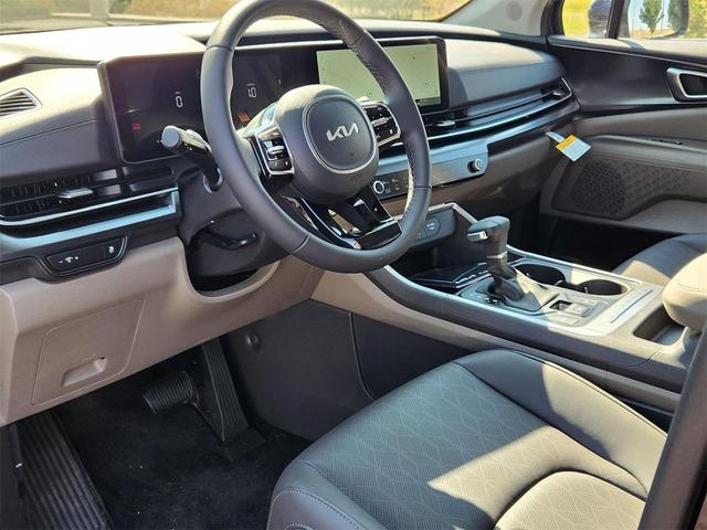 Photo of 2026 Deep Chroma Blue Kia Carnival