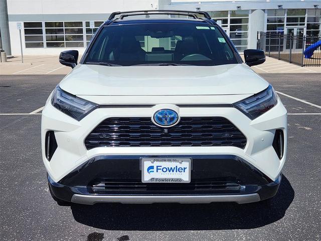 Photo of 2022 Blizzard Pearl/Midnight Black Metallic Toyota RAV4 Hybrid