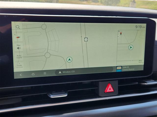 Photo of 2026 Deep Chroma Blue Kia Carnival Hybrid