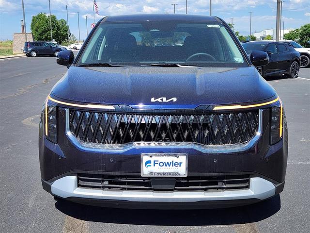 Photo of 2026 Deep Chroma Blue Kia Carnival Hybrid