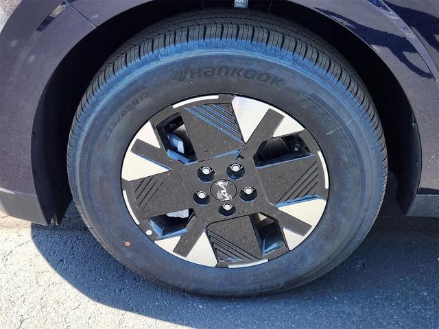 Photo of 2026 Deep Chroma Blue Kia Carnival Hybrid
