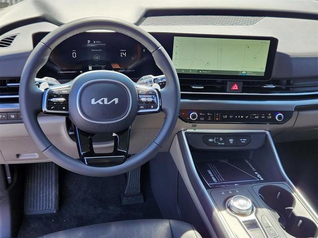 Photo of 2026 Deep Chroma Blue Kia Carnival Hybrid