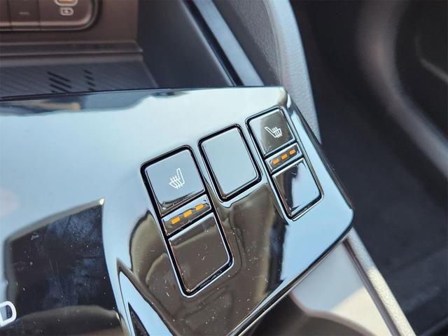 Photo of 2025 Gravity Gray Kia Sportage Hybrid