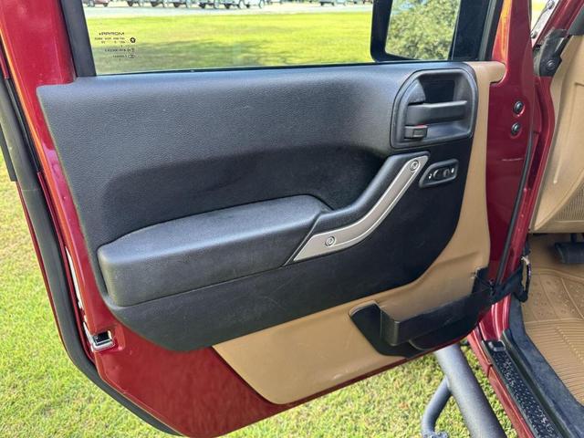 Photo of 2012 Deep Cherry Red Crystal Pearl Jeep Wrangler Unlimited