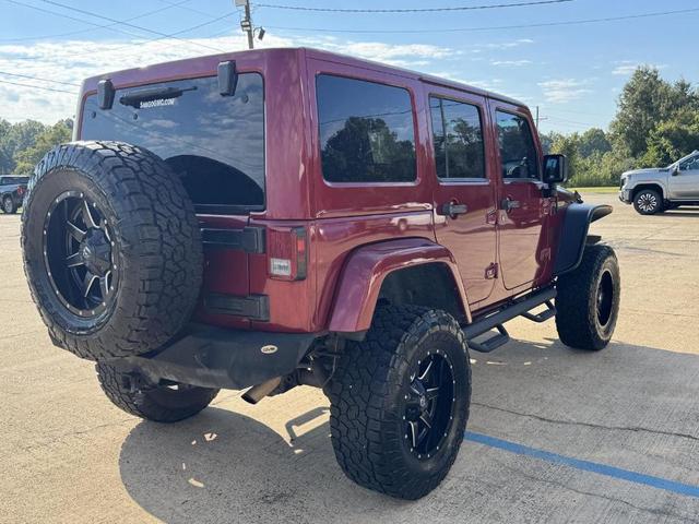 Photo of 2012 Deep Cherry Red Crystal Pearl Jeep Wrangler Unlimited